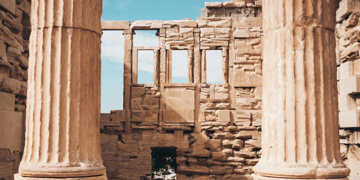 Tour guide explaining the history of the Erechtheion