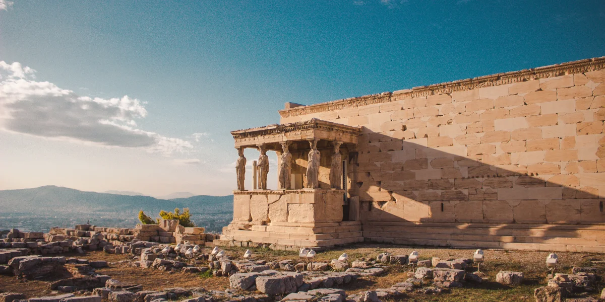 Golden hour sunlight illuminating the Acropolis