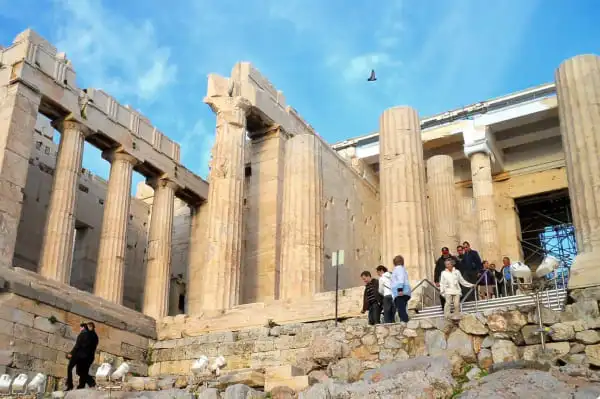 people leaving the Acropolis by the propylaea